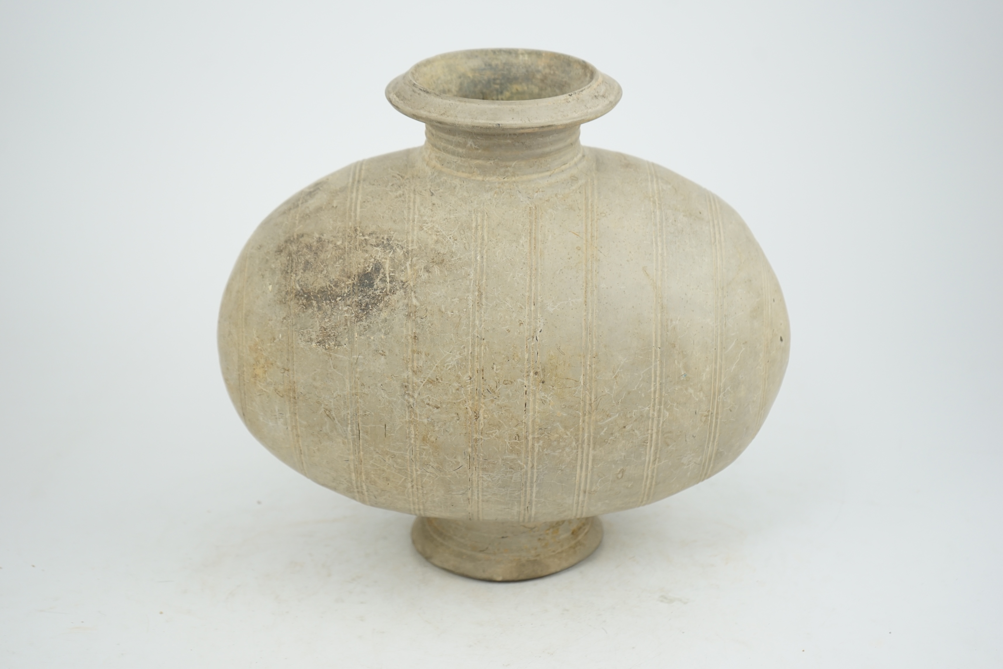 A fine large Chinese burnished pottery cocoon jar, Western Han Dynasty (206 BC-AD 8) or possibly as early as the Qin Dynasty (221-206 BC)